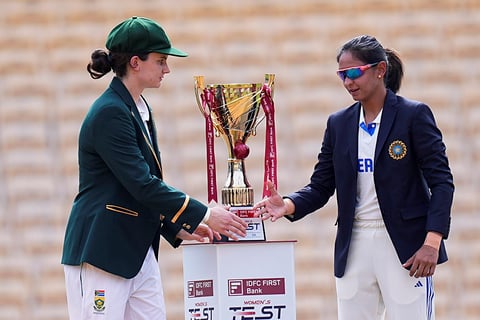 India Women's Harmanpreet Kaur and South Africa Women's Laura Wolvaardt 